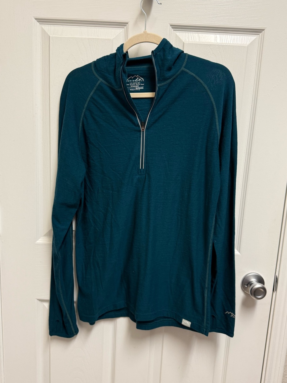 Merino Tech Teal Half Zip Hooded Top